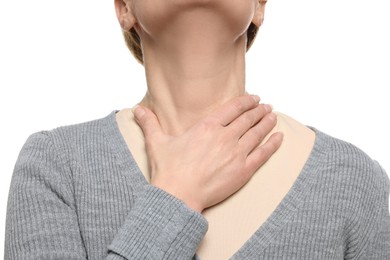 Photo of Woman suffering from sore throat on white background, closeup