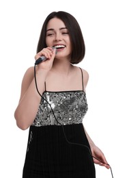 Photo of Beautiful young woman with microphone singing on white background