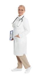 Photo of Mature doctor with clipboard and stethoscope on white background