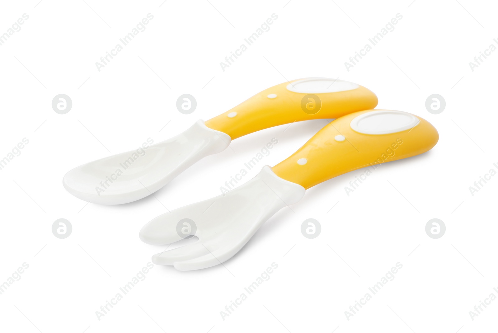 Photo of Plastic cutlery on white background. Serving baby food