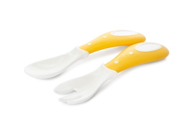 Plastic cutlery on white background. Serving baby food