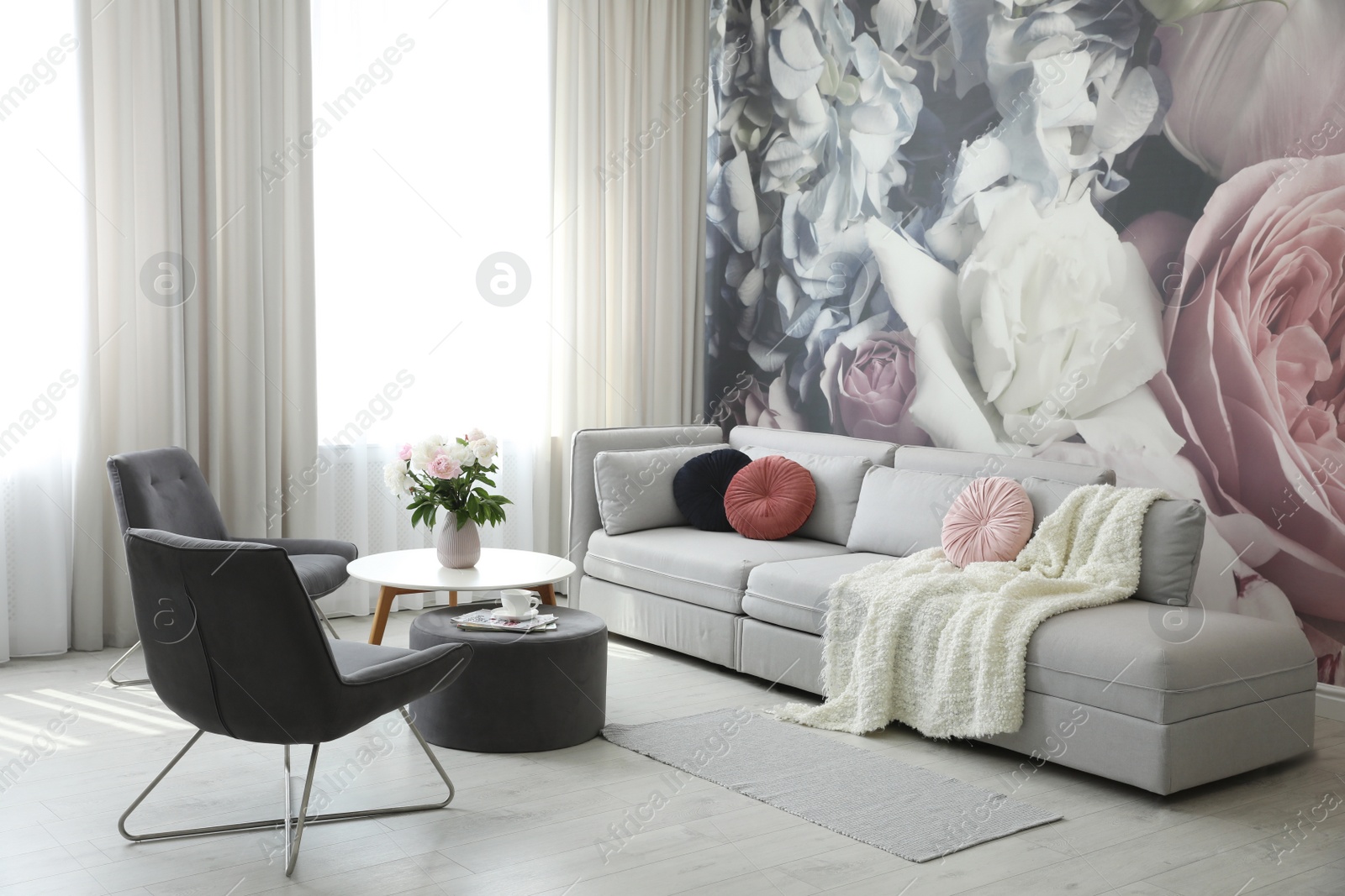 Photo of Modern living room interior with comfortable sofa and armchairs