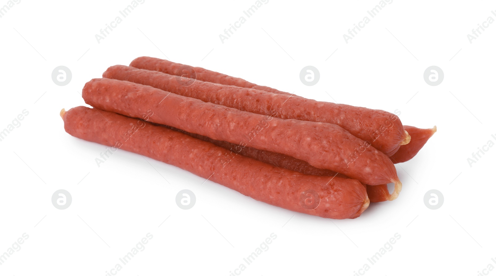 Photo of Thin dry smoked sausages isolated on white