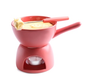 Pot of delicious cheese fondue and fork with bread on white background