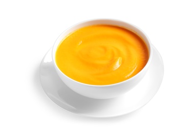 Delicious pumpkin cream soup in bowl on white background