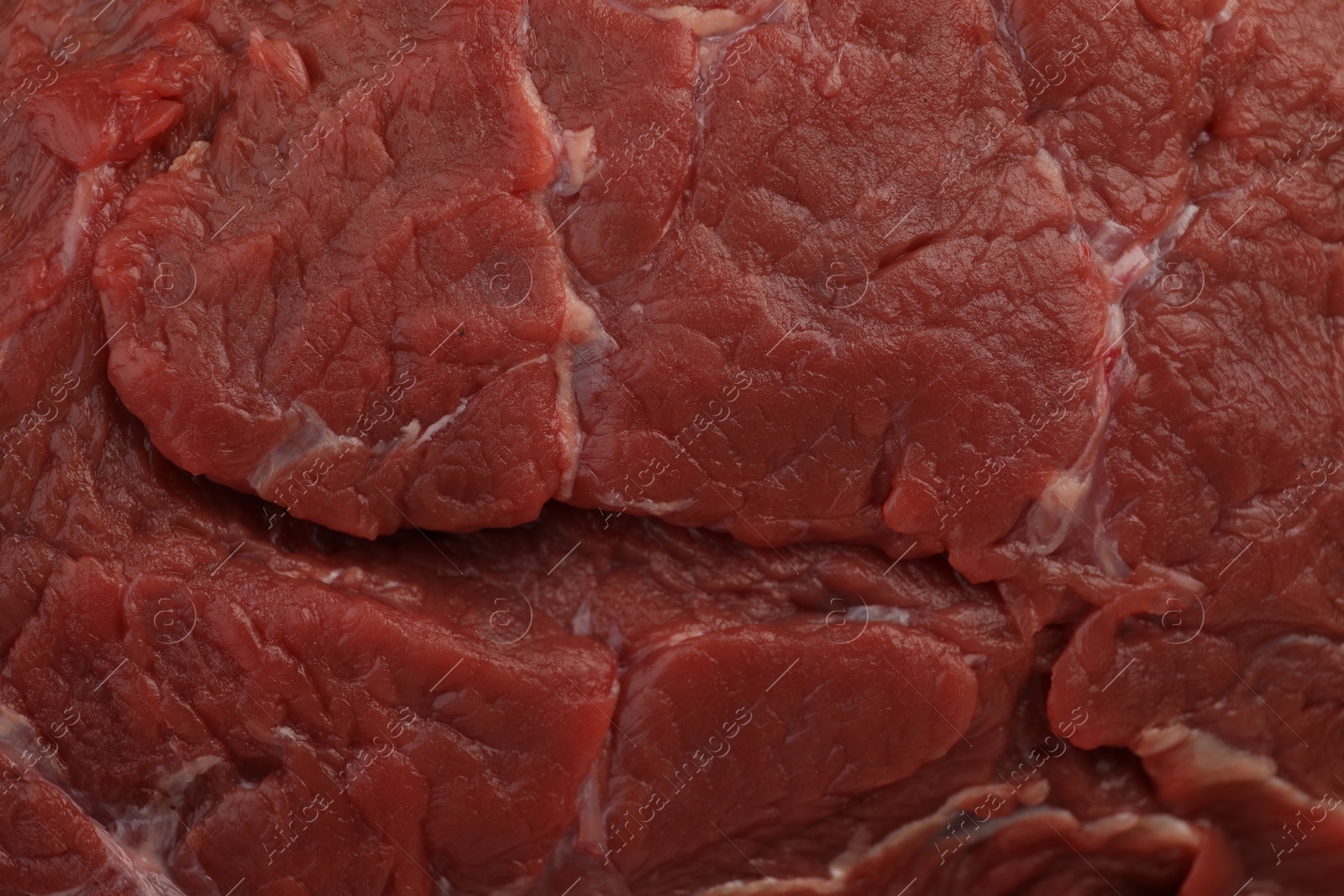 Photo of Piece of raw beef meat as background, top view