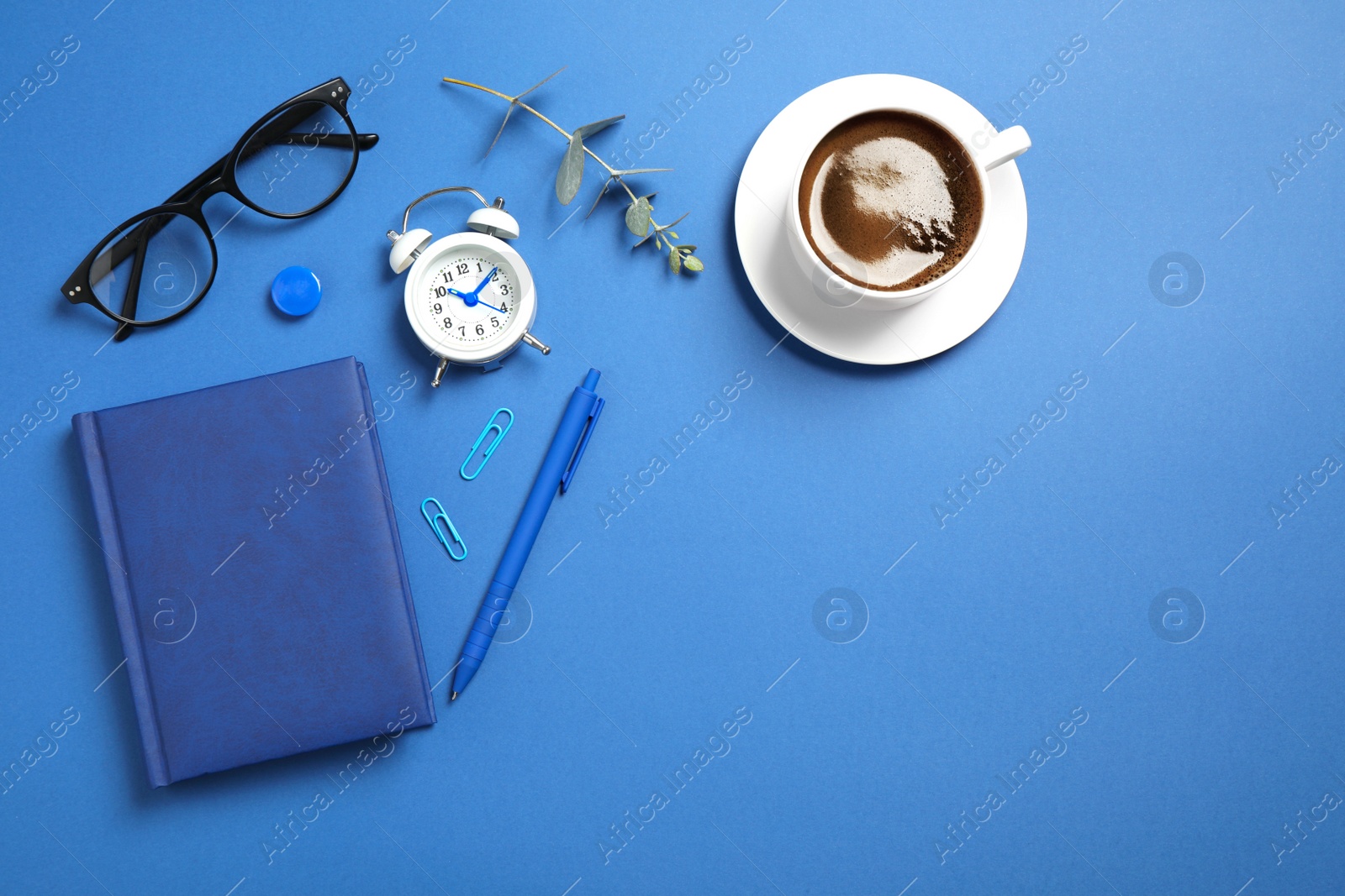 Photo of Flat lay composition inspired by color of the year 2020  (Classic blue). Space for text