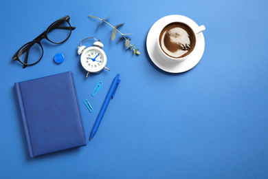Photo of Flat lay composition inspired by color of the year 2020  (Classic blue). Space for text