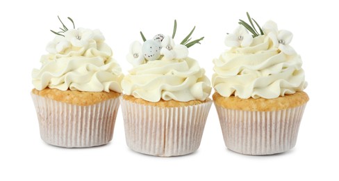 Tasty Easter cupcakes with vanilla cream isolated on white