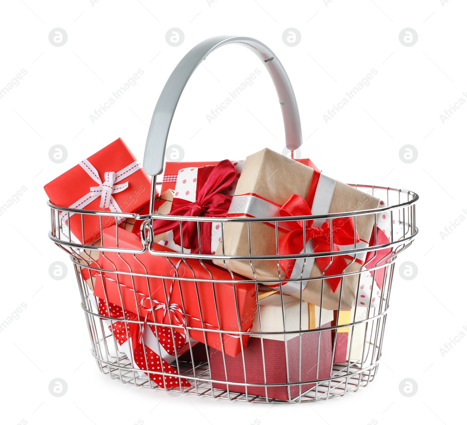 Photo of Shopping basket full of gift boxes on white background