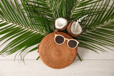 Photo of Flat lay composition with bamboo bag on wooden background