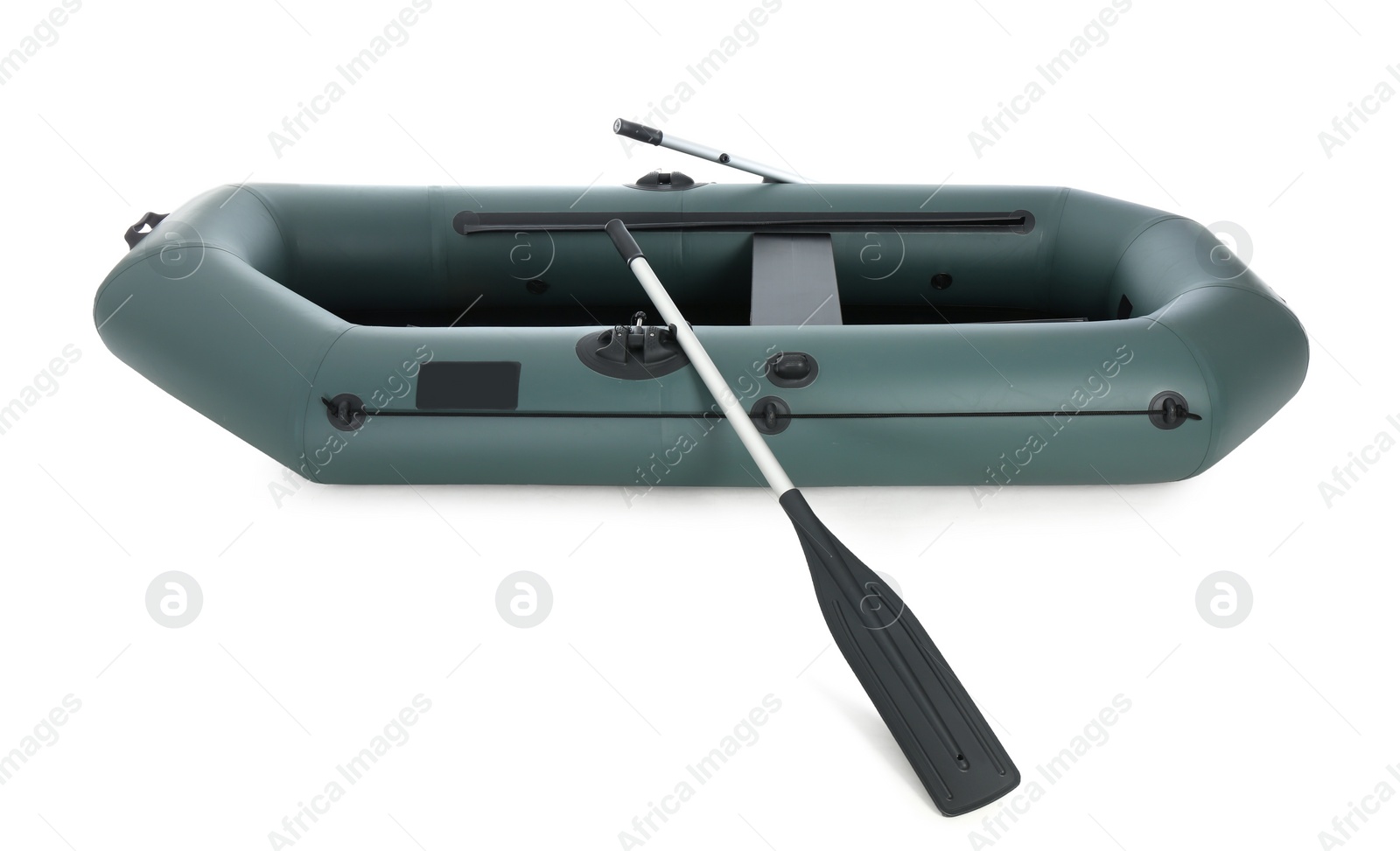 Photo of Inflatable rubber fishing boat with aluminium oars and seat isolated on white