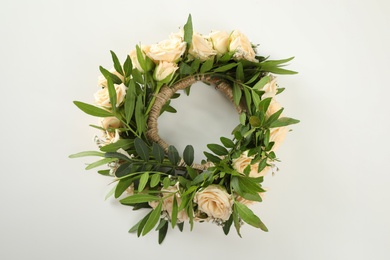 Wreath made of beautiful flowers isolated on white, top view