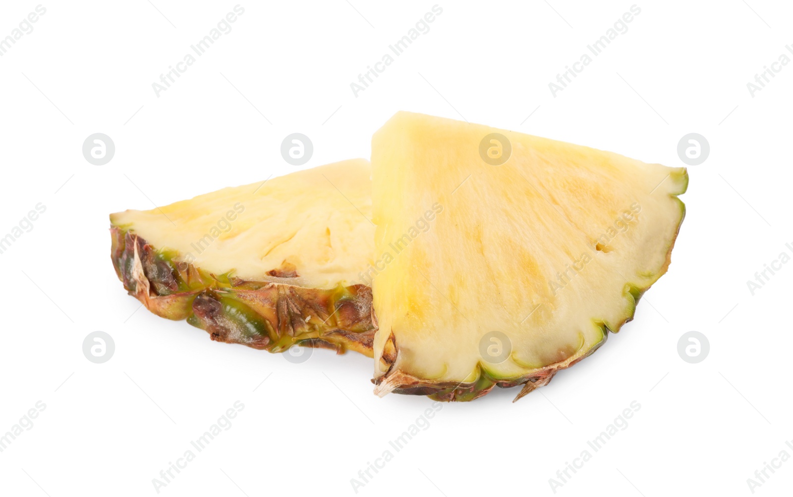 Photo of Slices of tasty ripe pineapple isolated on white