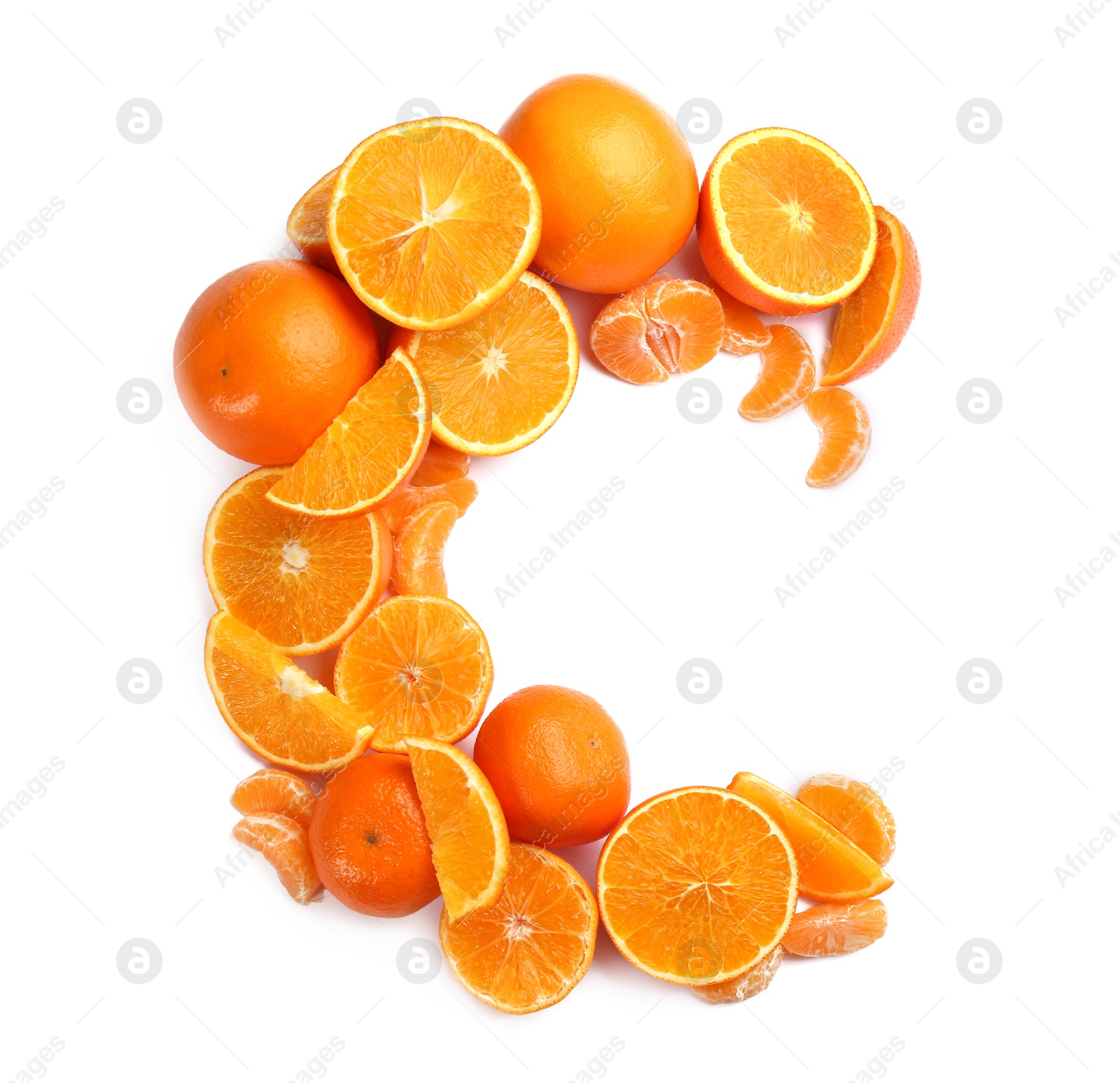 Photo of Letter C made with citrus fruits on white background as vitamin representation, top view