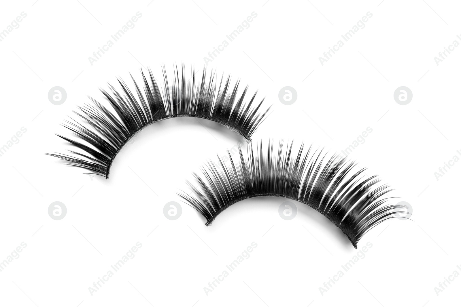 Photo of Beautiful pair of false eyelashes on white background