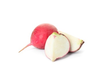 Cut and whole fresh ripe turnips on white background