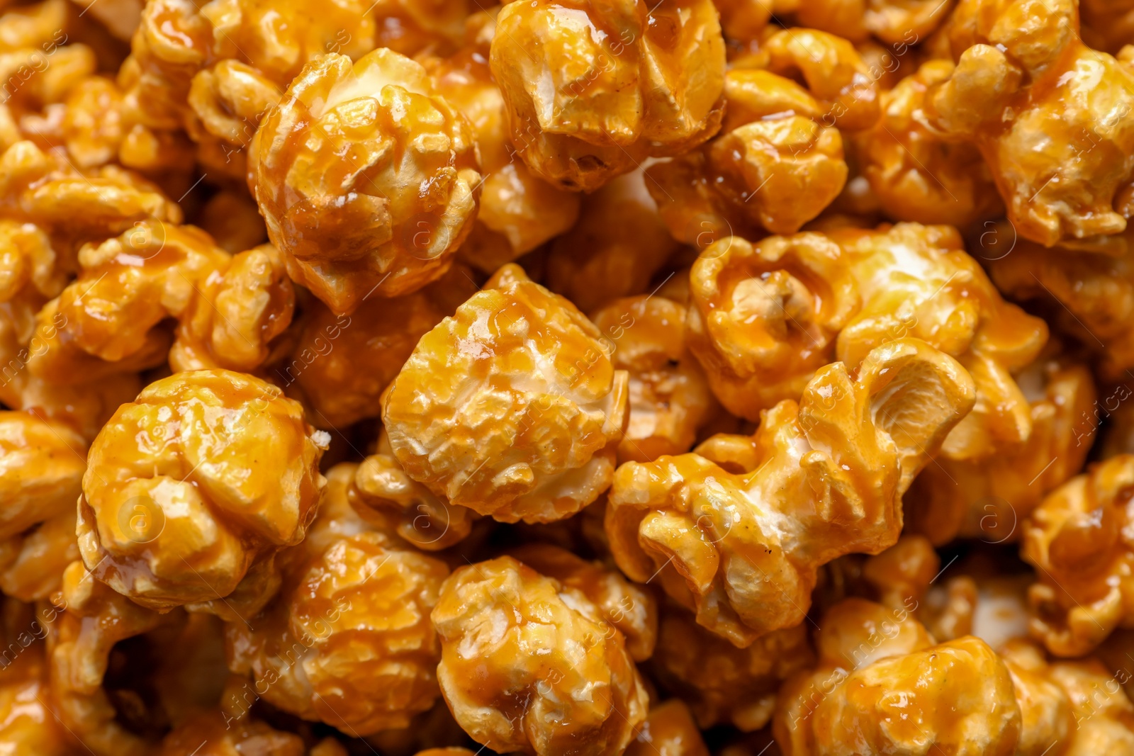 Photo of Yummy popcorn with caramel as background