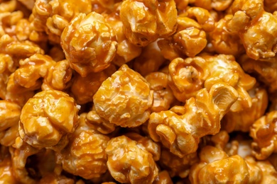Photo of Yummy popcorn with caramel as background