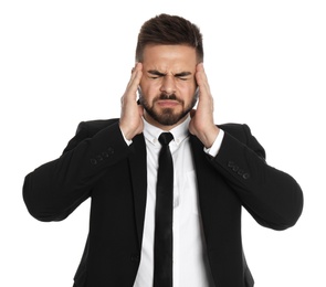 Photo of Businessman suffering from headache on white background