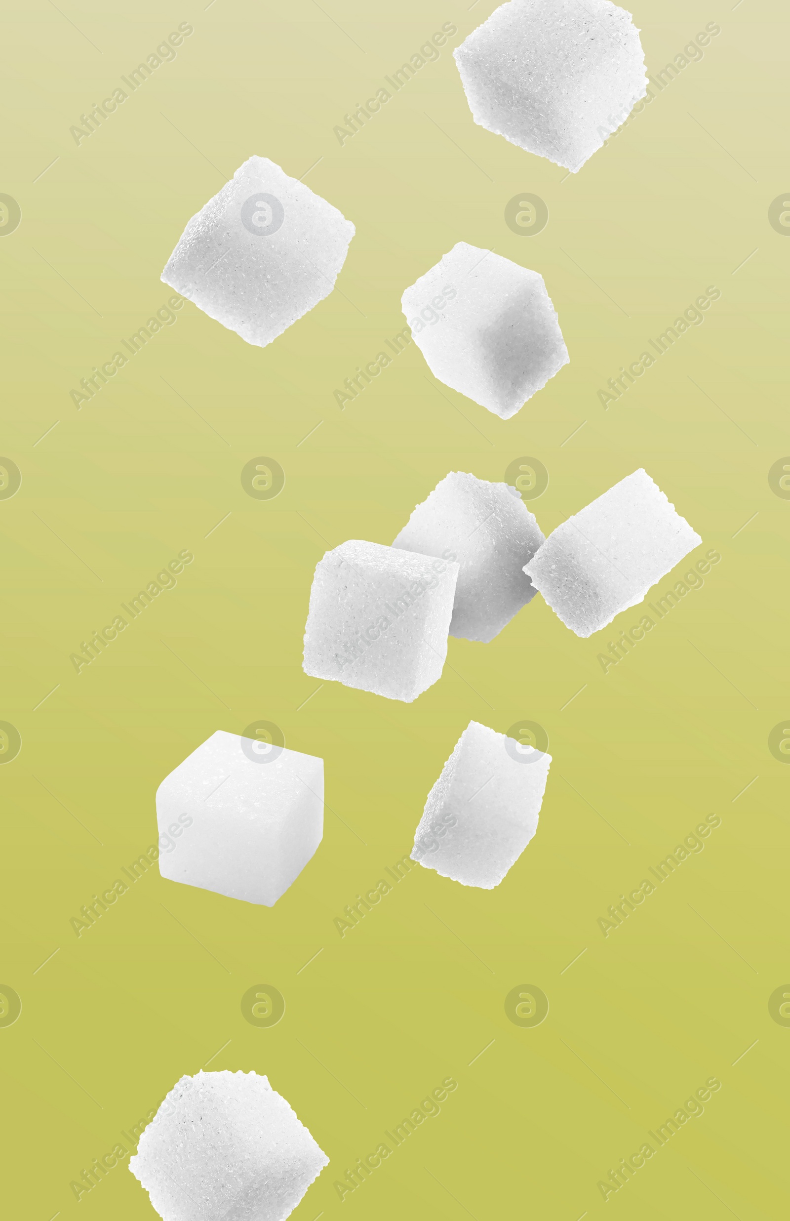 Image of Refined sugar cubes in air on color gradient background