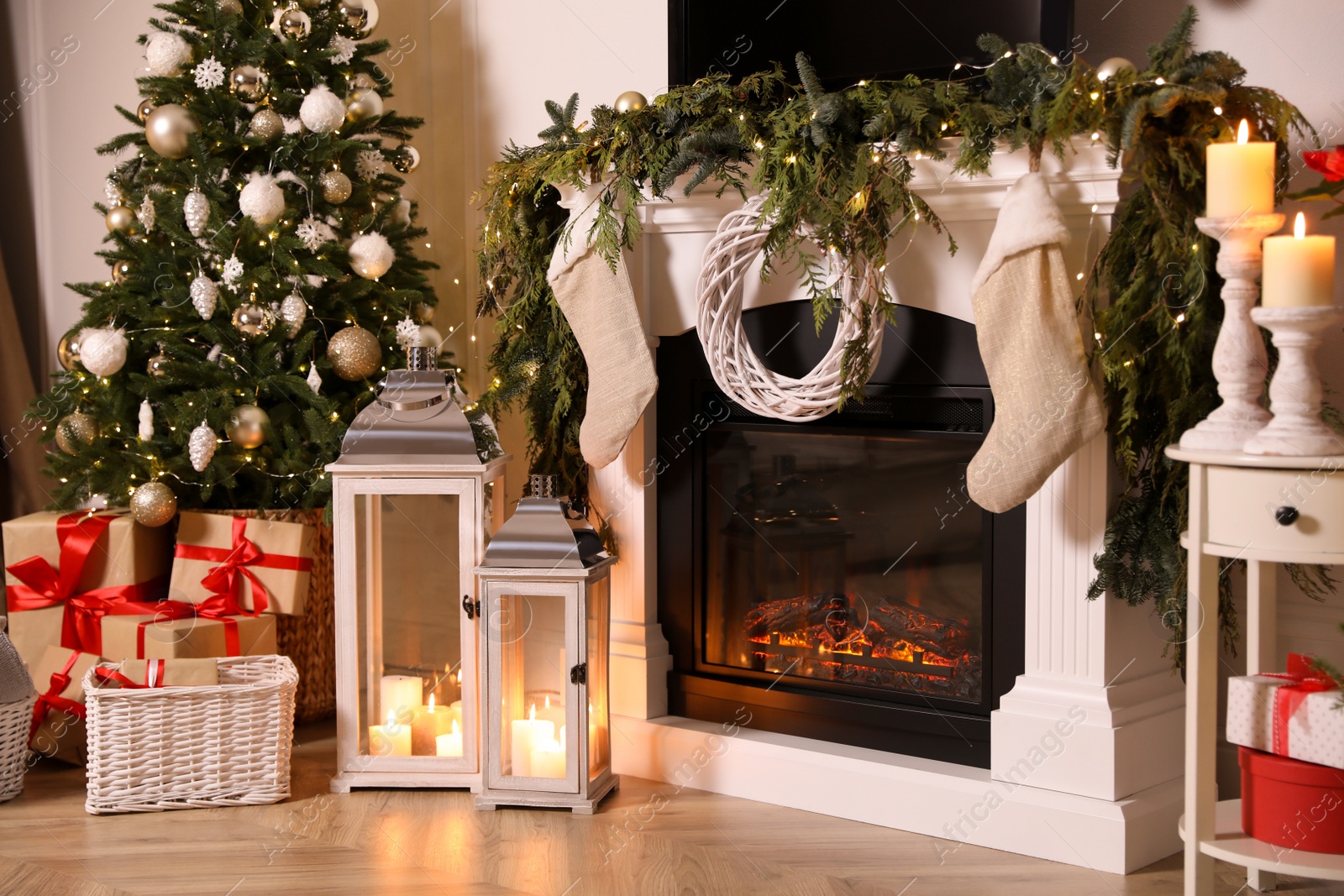 Photo of Beautiful room interior with fireplace and Christmas decor