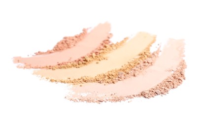 Photo of Swatches of different crushed face powders on white background