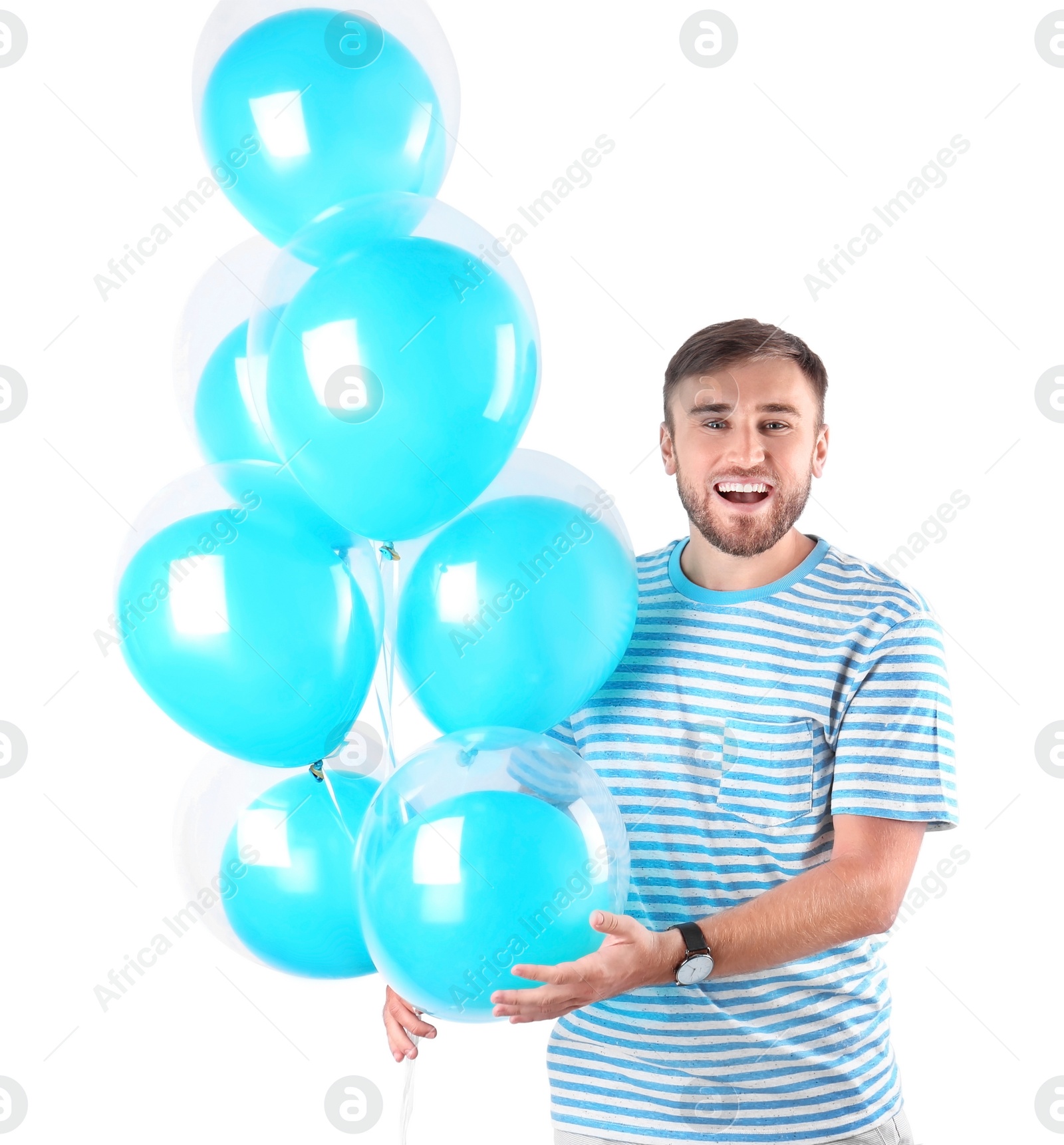 Photo of Young man with air balloons on white background