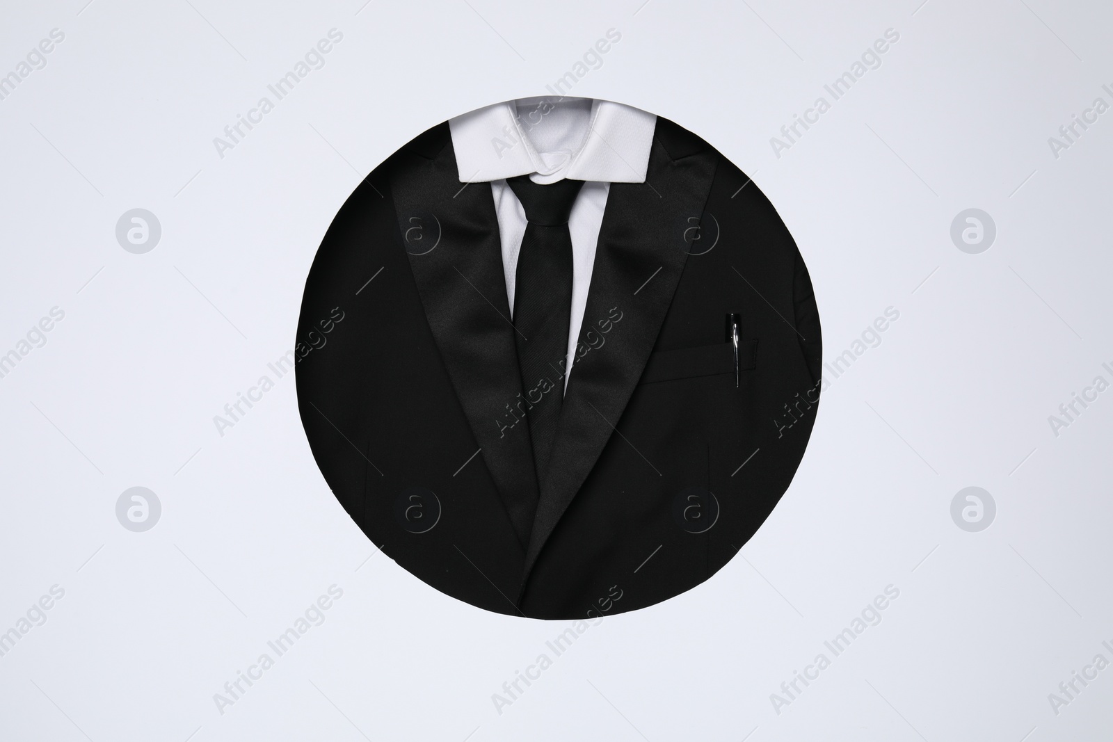 Photo of Creative business lunch layout. Hole with suit on white background, top view