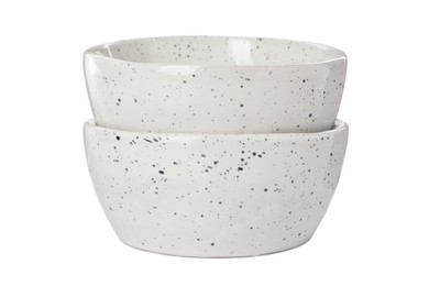 Beautiful empty ceramic bowls on white background