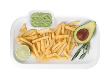 Photo of Tray with delicious french fries, avocado dip, lime and rosemary isolated on white, top view