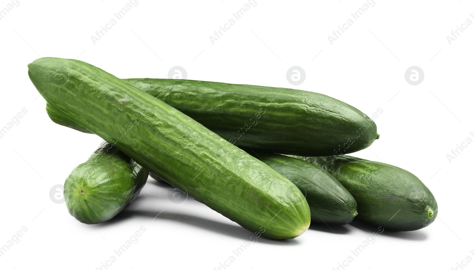 Photo of Many long fresh cucumbers isolated on white