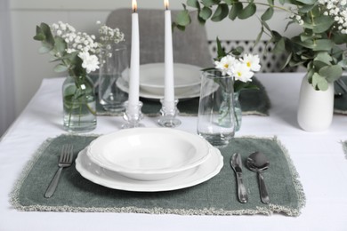 Elegant festive setting with floral decor on table