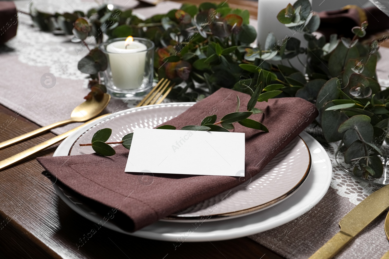 Photo of Luxury table setting with beautiful decor and blank card. Festive dinner