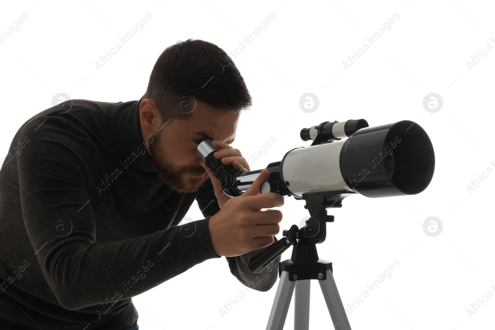 Photo of Astronomer looking at stars through telescope on white background