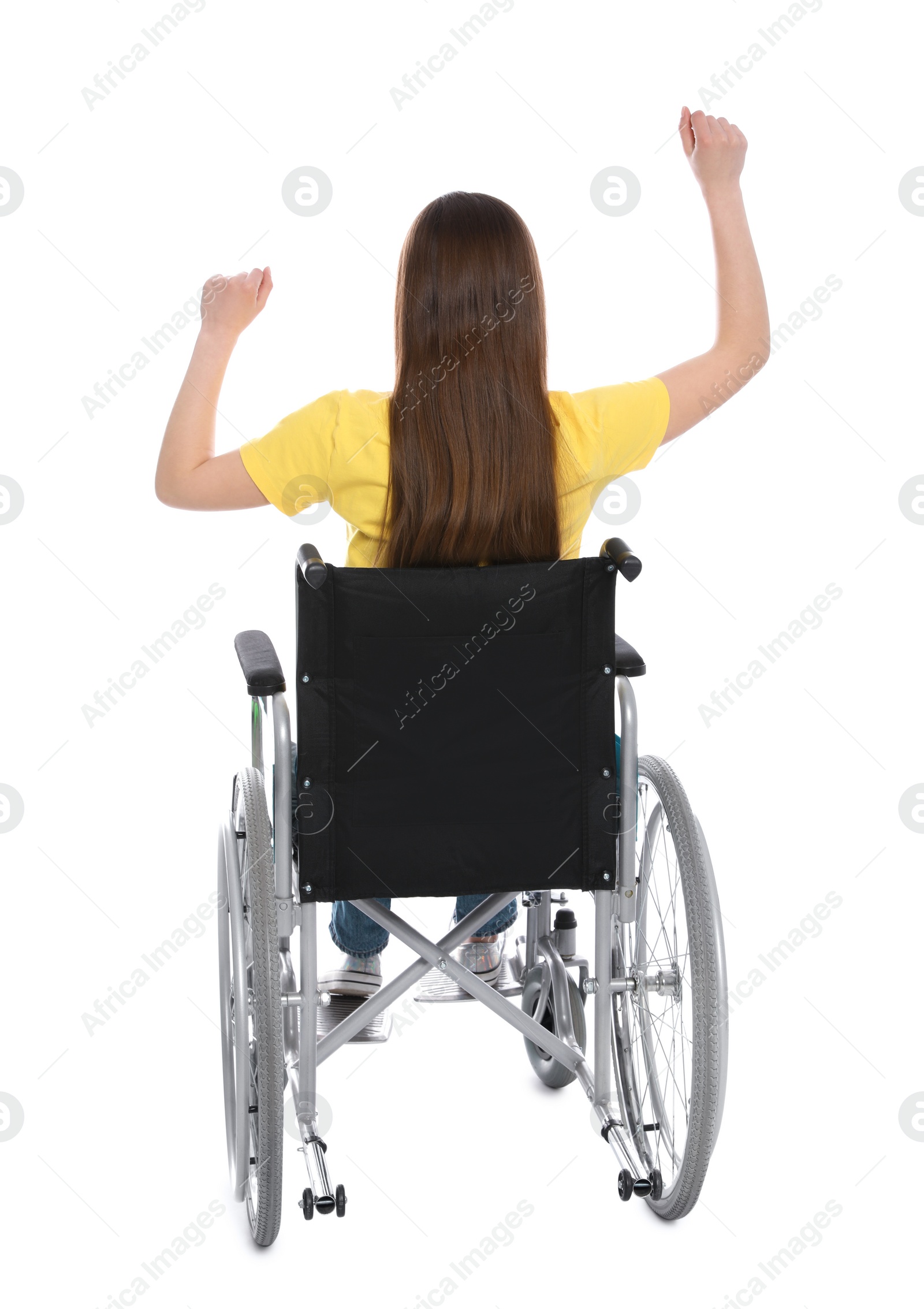 Photo of Young woman in wheelchair isolated on white, back view