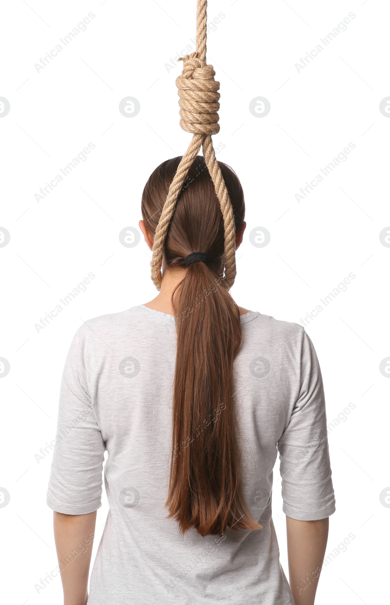 Photo of Woman with rope noose on neck against white background, back view