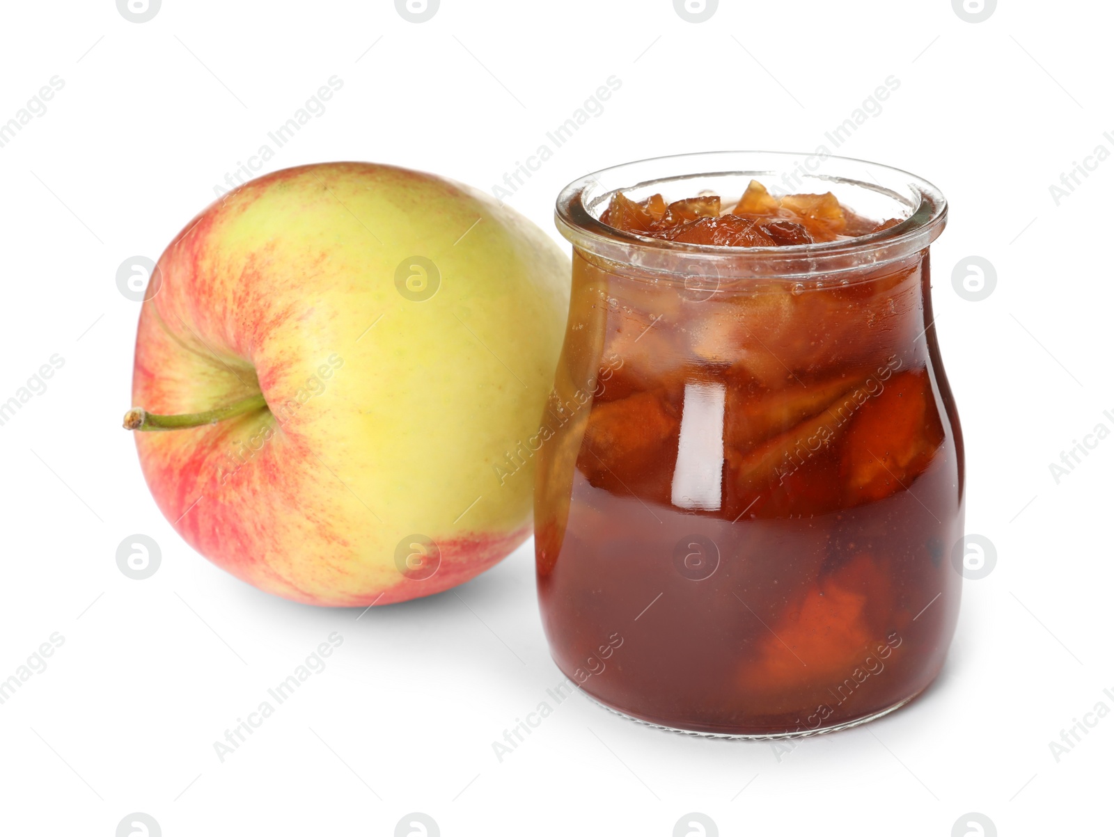 Photo of Tasty apple jam in glass jar and fresh fruit on white background