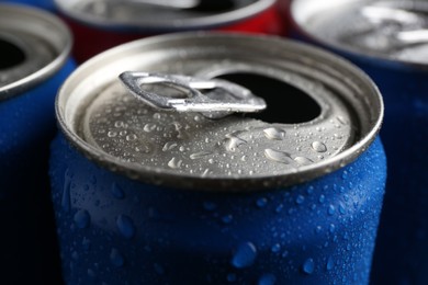 Photo of Energy drink in wet can as background, closeup. Functional beverage