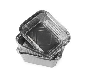 Photo of Three aluminum foil containers isolated on white