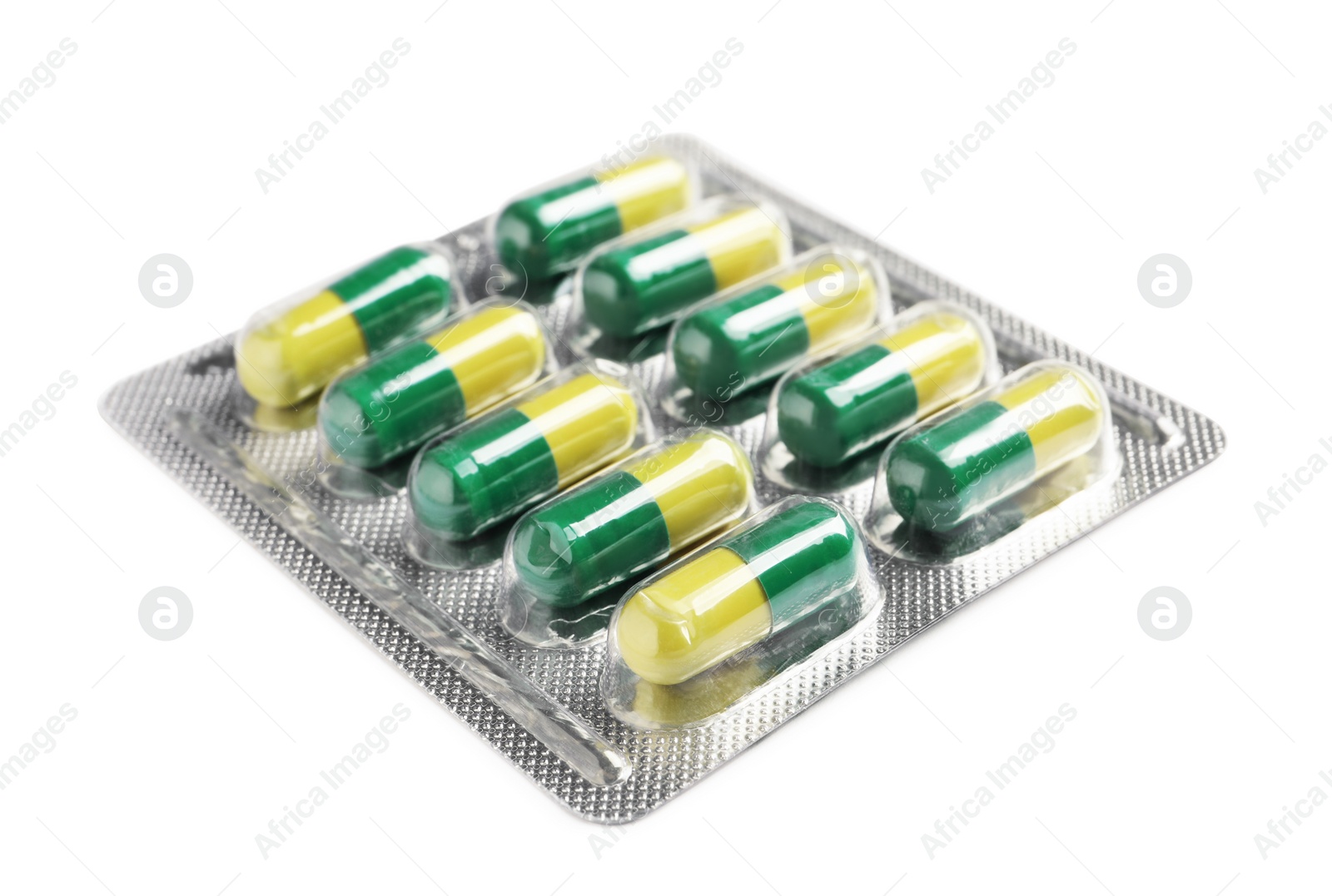 Photo of Blister with bright pills isolated on white