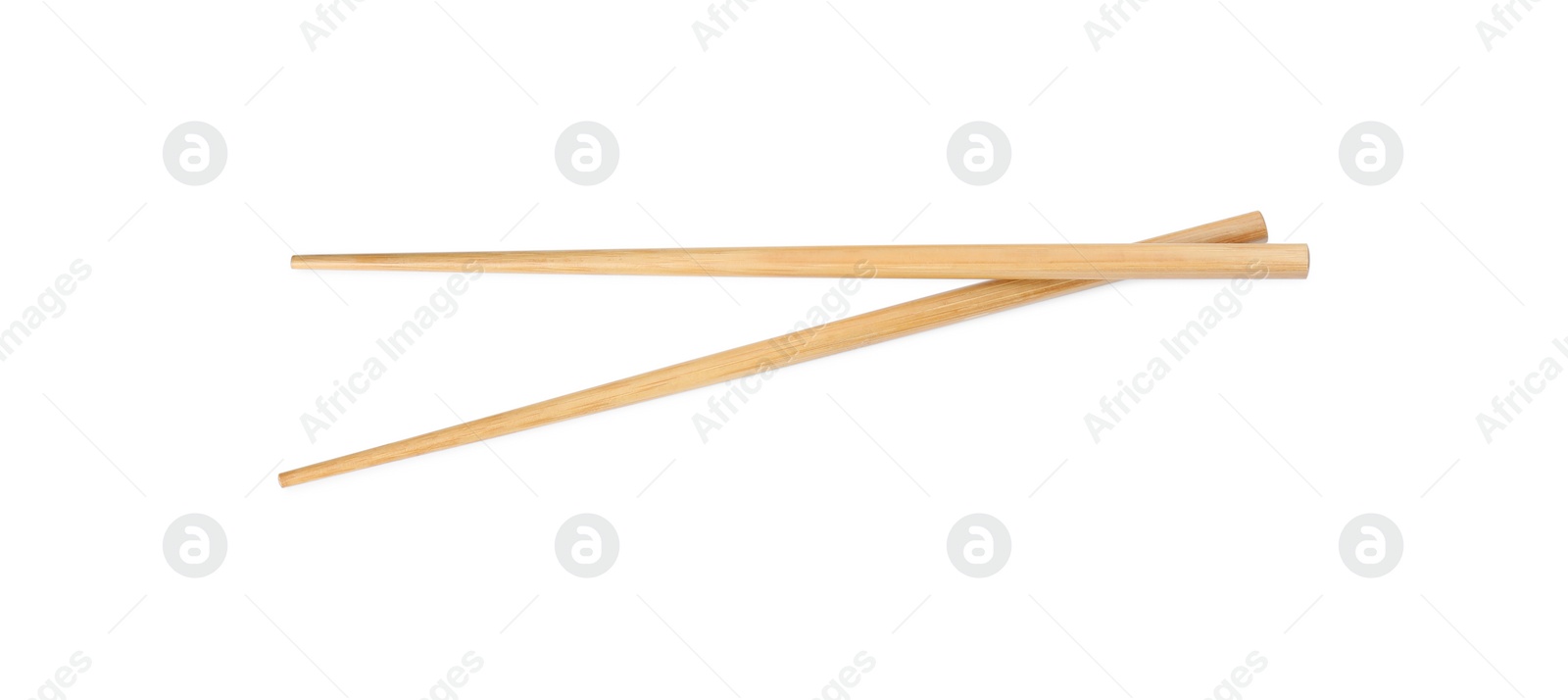 Photo of Pair of wooden chopsticks isolated on white, top view