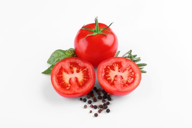 Photo of Ripe tomatoes, basil, rosemary and spices on white background