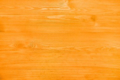 Texture of orange wooden surface, top view