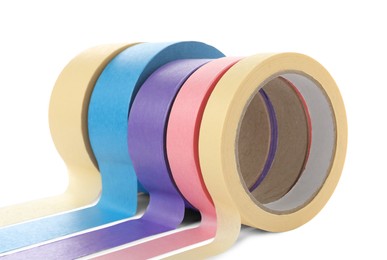 Many different rolls of adhesive tape on white background