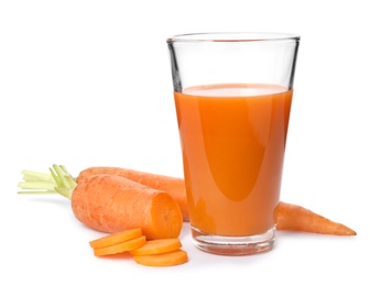 Carrot and glass of fresh juice on white background