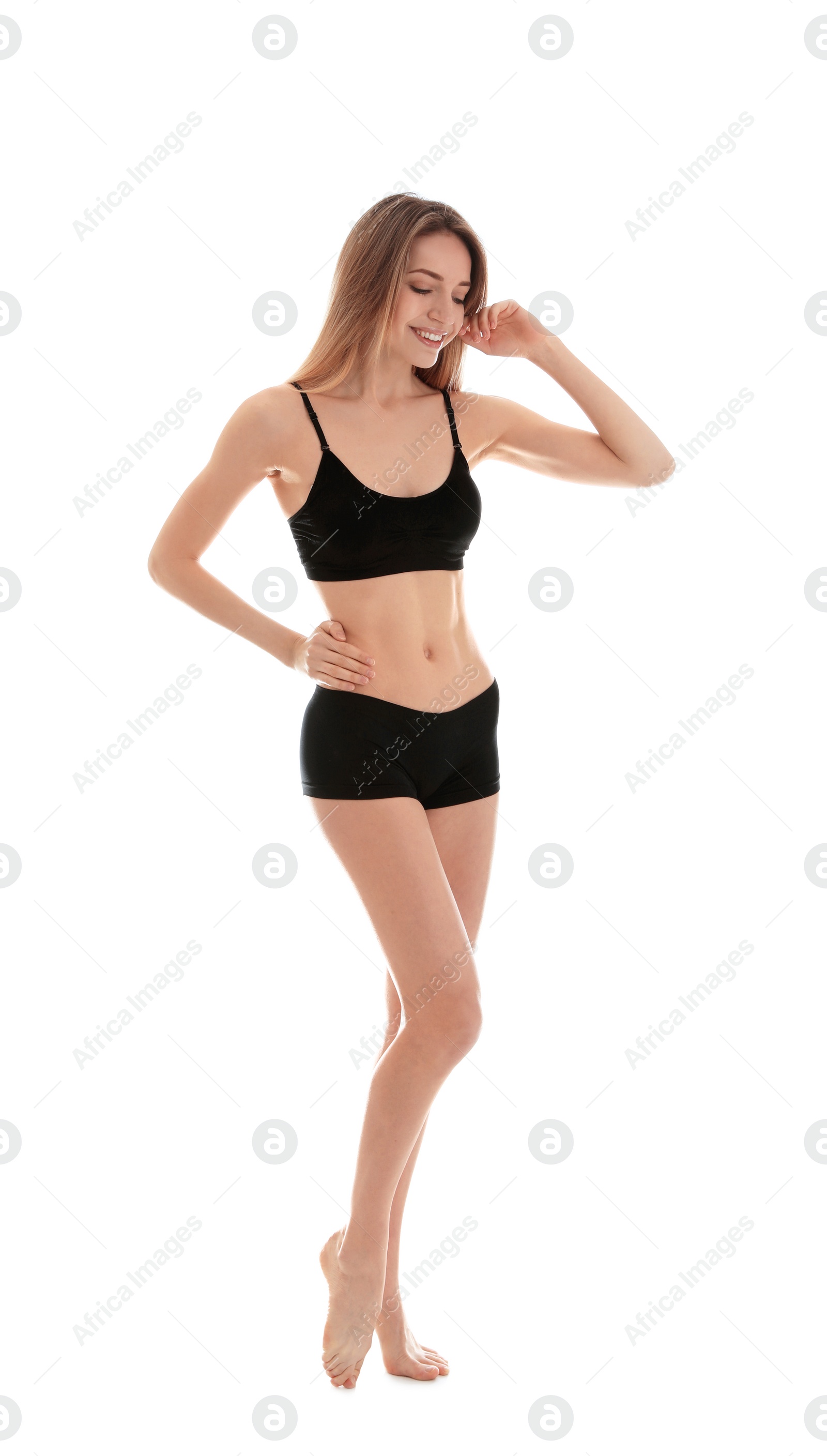 Photo of Young slim woman on white background. Perfect body