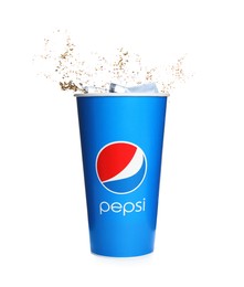 MYKOLAIV, UKRAINE - JUNE 9, 2021: Pepsi splashing out of paper cup isolated on white