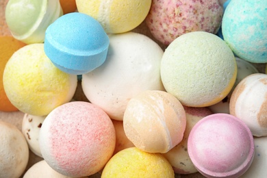 Many bath bombs as background, top view