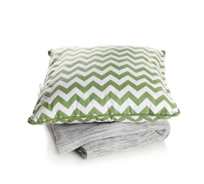 Stylish soft pillow and folded plaid on white background